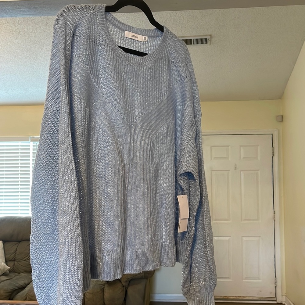Brand new with tags. Beautiful blue sweater. Winter is coming.